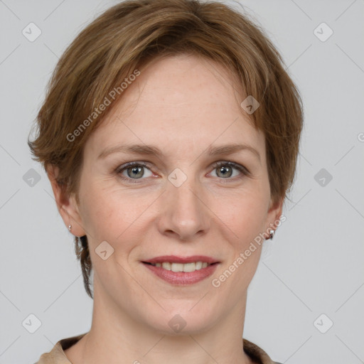 Joyful white adult female with short  brown hair and grey eyes