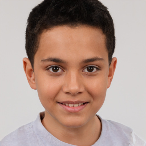 Joyful white child male with short  brown hair and brown eyes