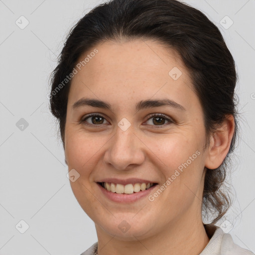 Joyful white young-adult female with medium  brown hair and brown eyes