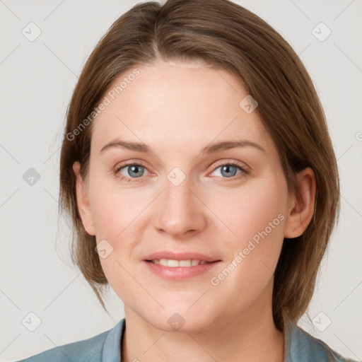 Joyful white young-adult female with medium  brown hair and blue eyes