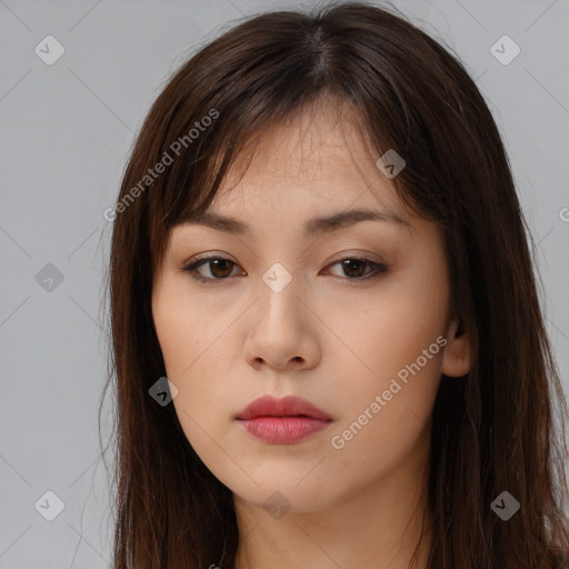 Neutral white young-adult female with long  brown hair and brown eyes