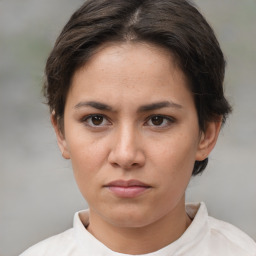 Neutral white young-adult female with short  brown hair and brown eyes