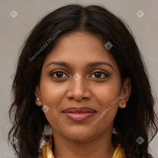 Joyful black young-adult female with long  brown hair and brown eyes