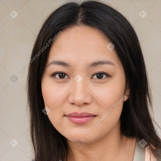 Joyful asian young-adult female with long  brown hair and brown eyes