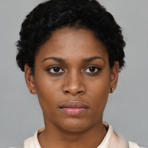 Neutral black young-adult female with short  black hair and brown eyes