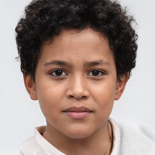 Joyful white child male with short  brown hair and brown eyes