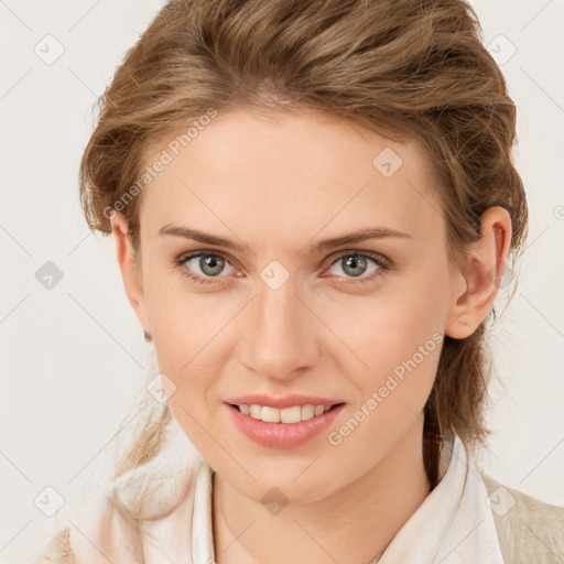 Joyful white young-adult female with medium  brown hair and blue eyes