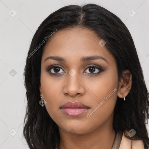 Joyful latino young-adult female with long  black hair and brown eyes