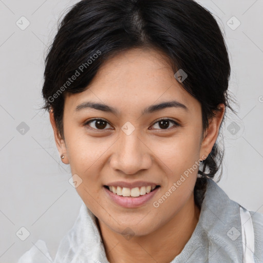 Joyful asian young-adult female with medium  brown hair and brown eyes