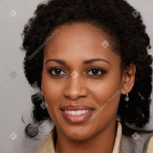 Joyful black young-adult female with long  brown hair and brown eyes