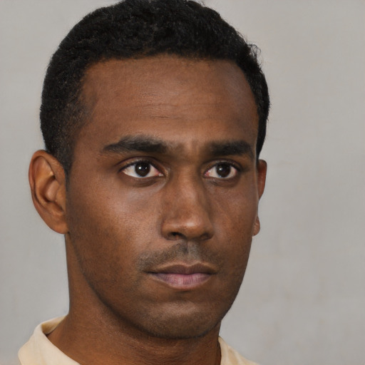 Neutral black young-adult male with short  black hair and brown eyes