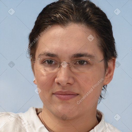 Joyful white adult female with short  brown hair and brown eyes