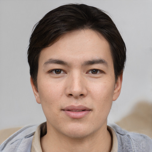 Neutral asian young-adult male with short  brown hair and brown eyes