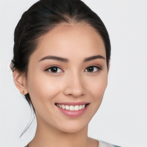 Joyful white young-adult female with medium  black hair and brown eyes