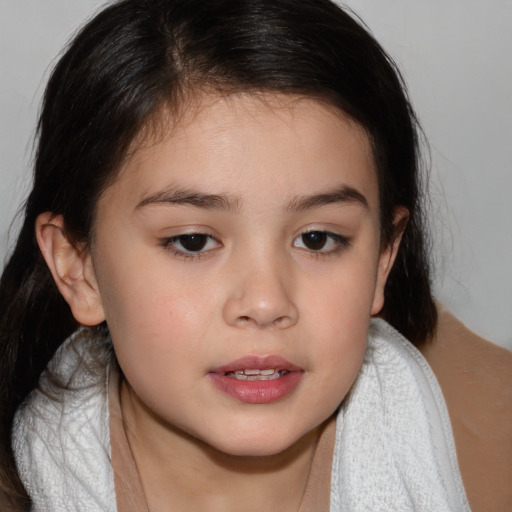 Joyful white child female with medium  brown hair and brown eyes