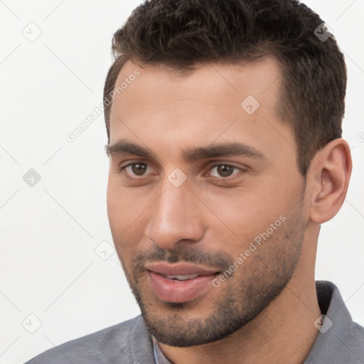 Neutral white young-adult male with short  brown hair and brown eyes