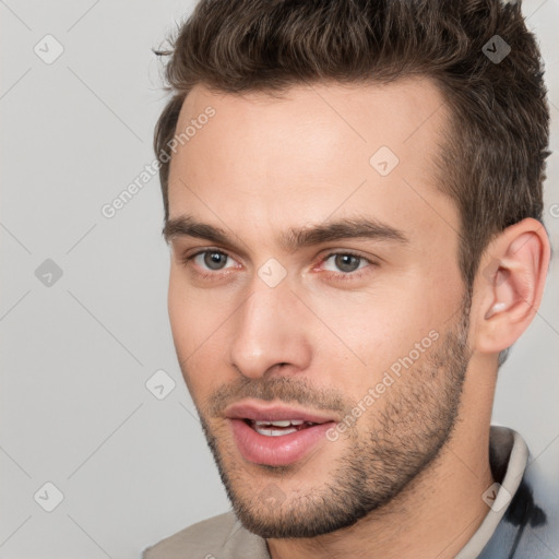 Neutral white young-adult male with short  brown hair and brown eyes