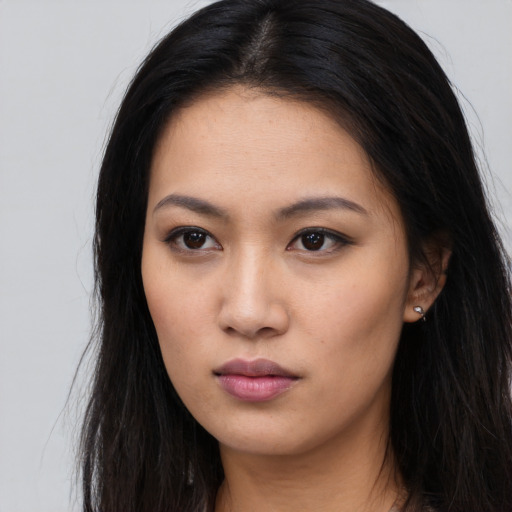 Neutral asian young-adult female with long  black hair and brown eyes