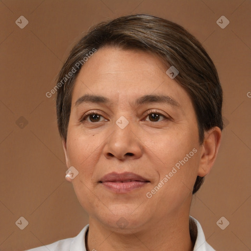 Joyful white adult female with short  brown hair and brown eyes