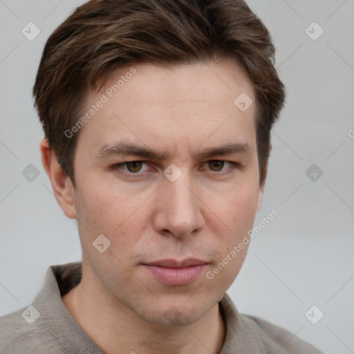 Joyful white adult male with short  brown hair and grey eyes