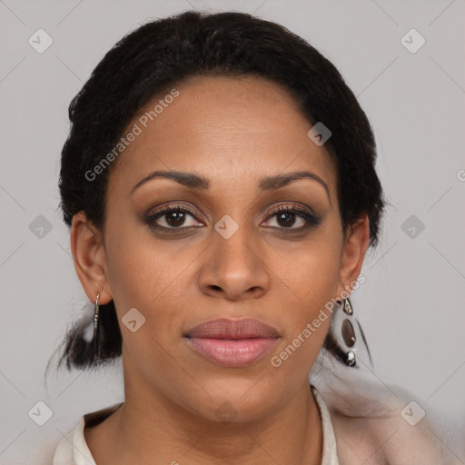 Joyful black adult female with medium  black hair and brown eyes