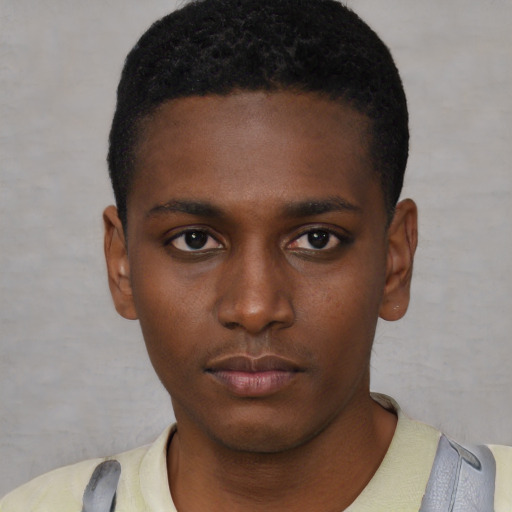 Neutral black young-adult male with short  black hair and brown eyes