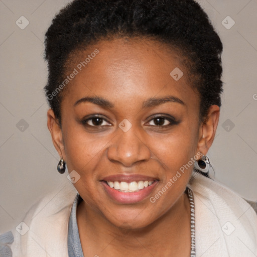 Joyful black young-adult female with short  brown hair and brown eyes