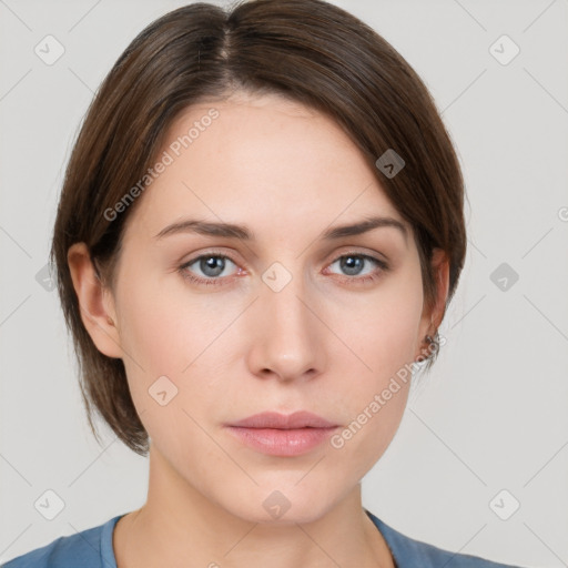 Neutral white young-adult female with medium  brown hair and grey eyes