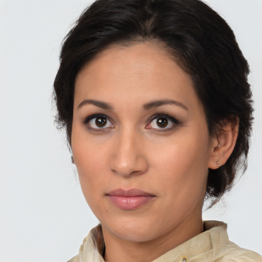 Neutral latino young-adult female with medium  brown hair and brown eyes