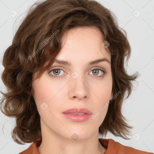 Neutral white young-adult female with medium  brown hair and green eyes