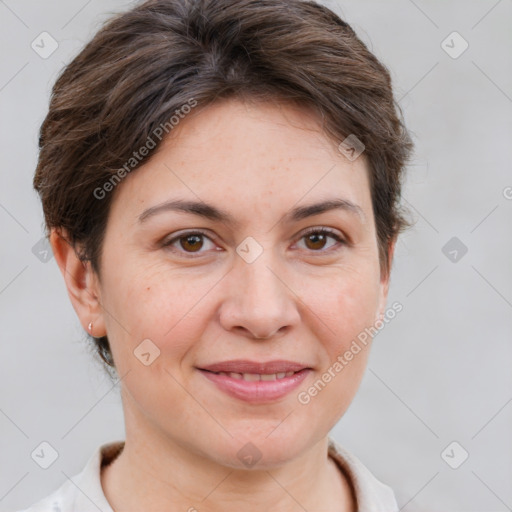 Joyful white adult female with short  brown hair and brown eyes