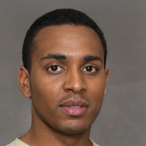 Neutral black young-adult male with short  brown hair and brown eyes