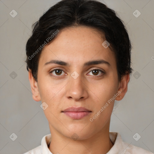 Joyful white young-adult female with short  brown hair and brown eyes