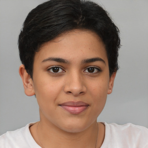 Joyful latino young-adult female with short  brown hair and brown eyes