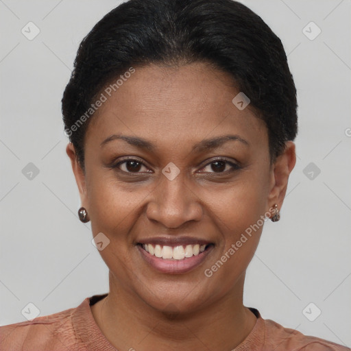 Joyful black young-adult female with short  brown hair and brown eyes