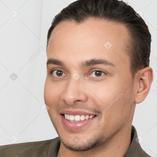 Joyful white young-adult male with short  brown hair and brown eyes