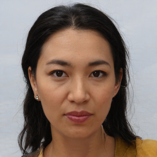 Neutral asian young-adult female with medium  brown hair and brown eyes
