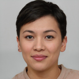 Joyful asian young-adult female with short  brown hair and brown eyes