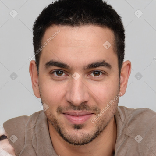 Joyful white young-adult male with short  brown hair and brown eyes