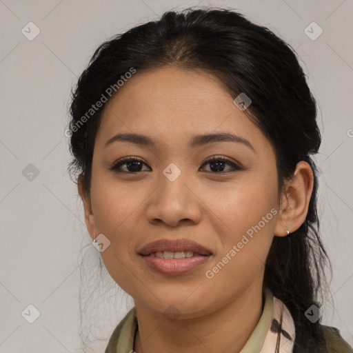 Joyful latino young-adult female with medium  brown hair and brown eyes