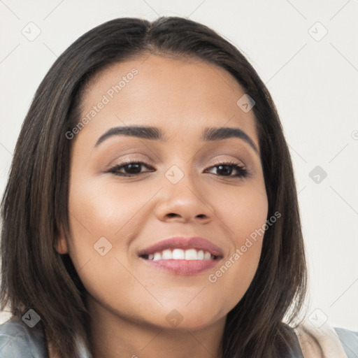 Joyful asian young-adult female with long  brown hair and brown eyes