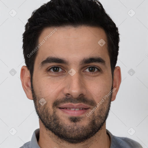 Joyful white young-adult male with short  black hair and brown eyes