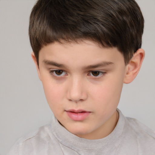 Neutral white child male with short  brown hair and brown eyes