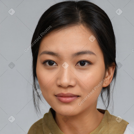 Joyful asian young-adult female with medium  black hair and brown eyes