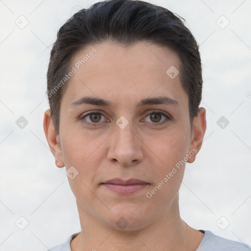 Joyful white young-adult female with short  brown hair and brown eyes