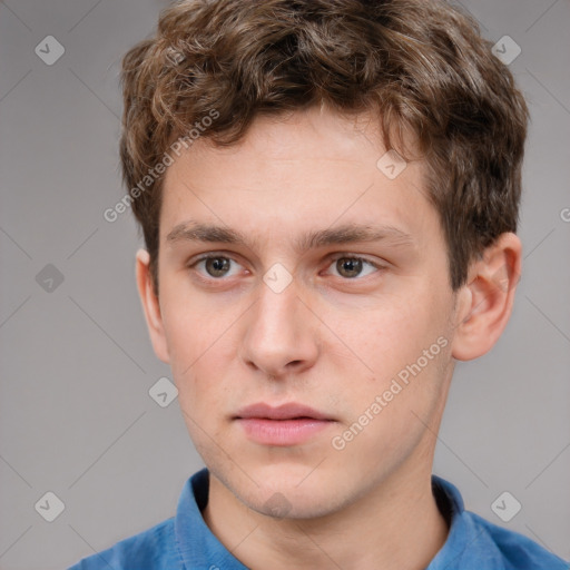 Neutral white young-adult male with short  brown hair and grey eyes