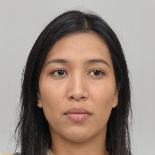 Neutral asian young-adult female with long  brown hair and brown eyes
