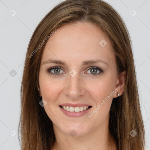 Joyful white young-adult female with long  brown hair and grey eyes