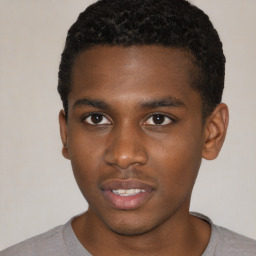 Neutral black young-adult male with short  brown hair and brown eyes