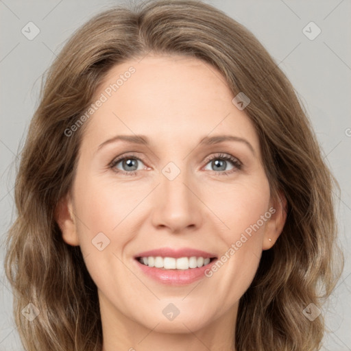 Joyful white young-adult female with medium  brown hair and green eyes